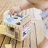 Kép 9/10 - Zopa fa játék formabedobó és matató kocka montessori