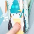Kép 2/10 - Taf Toys játék autóba Penguin Play and Kick Car Toy zenélő pingvin
